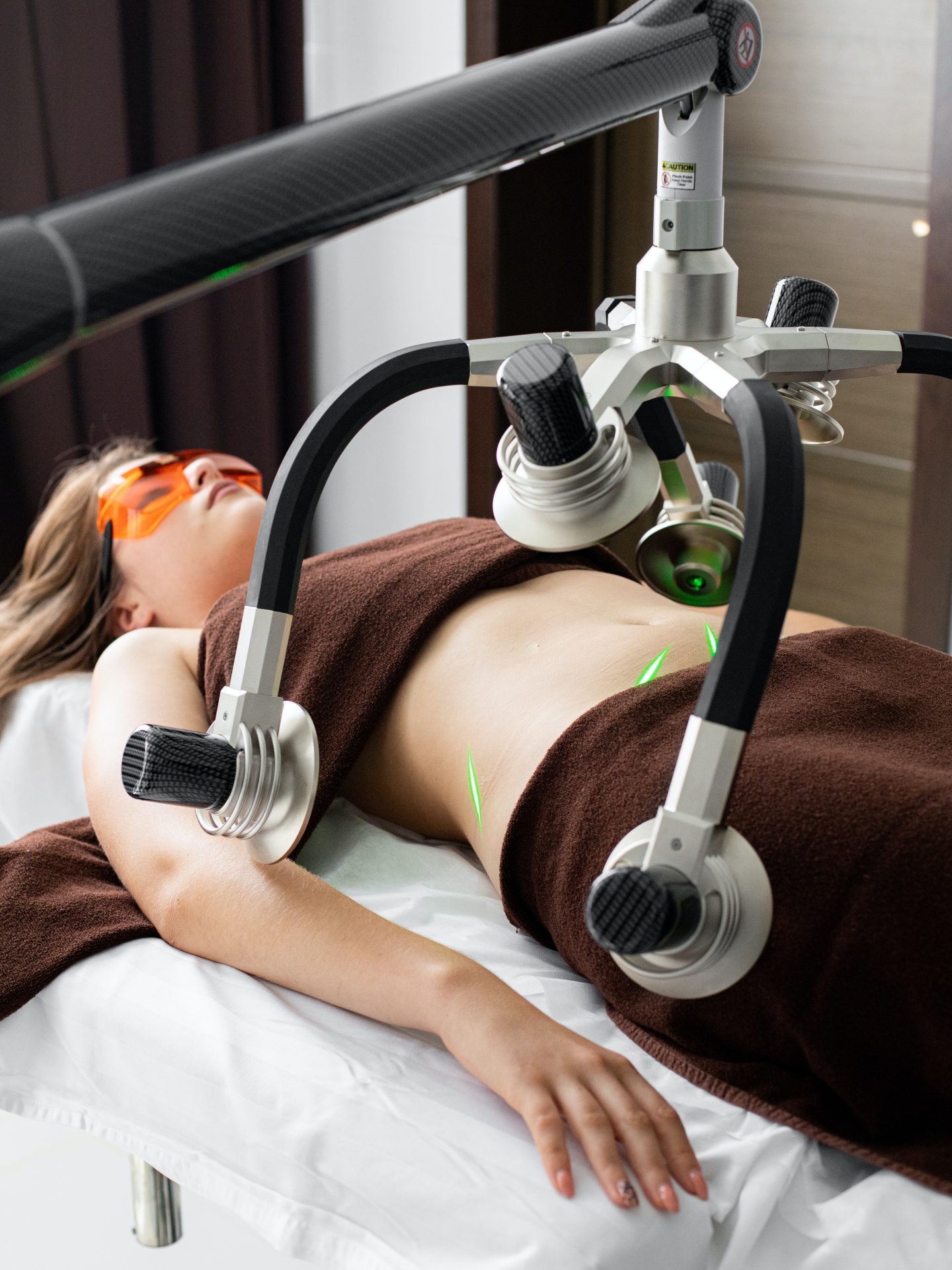 woman getting laser liposuction